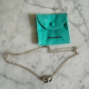 Tiffany & Co Infiniti necklace.